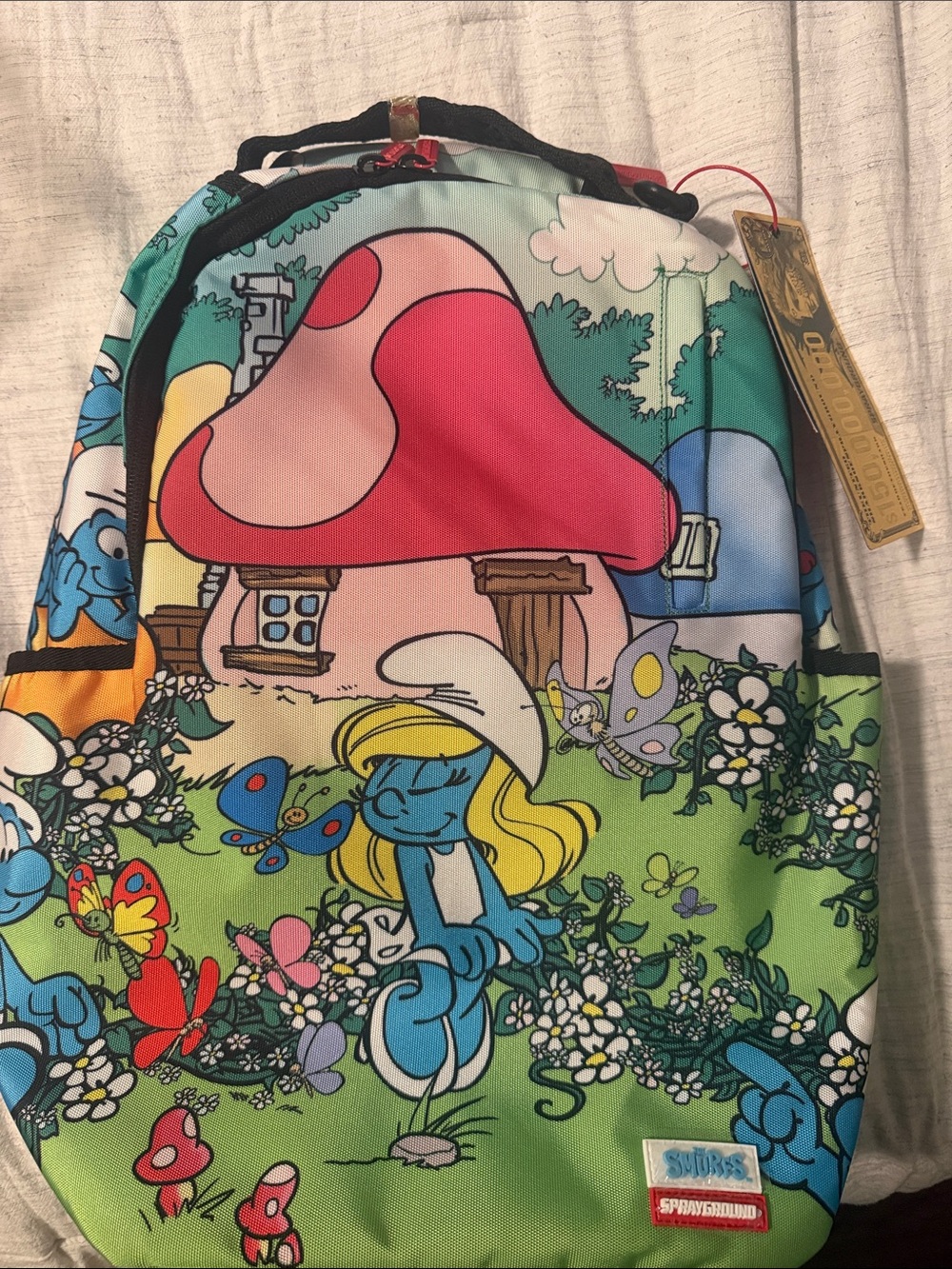 Sprayground Black Backpack with Blue, Green & Red Smurfs Print